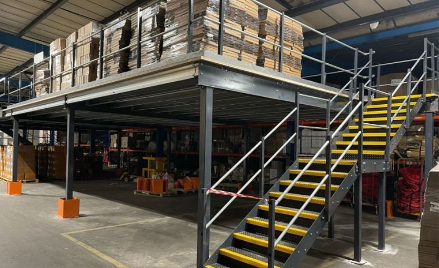 Industrial mezzanine floor installation maximizing warehouse storage space