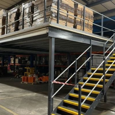 Industrial mezzanine floor installation maximizing warehouse storage space